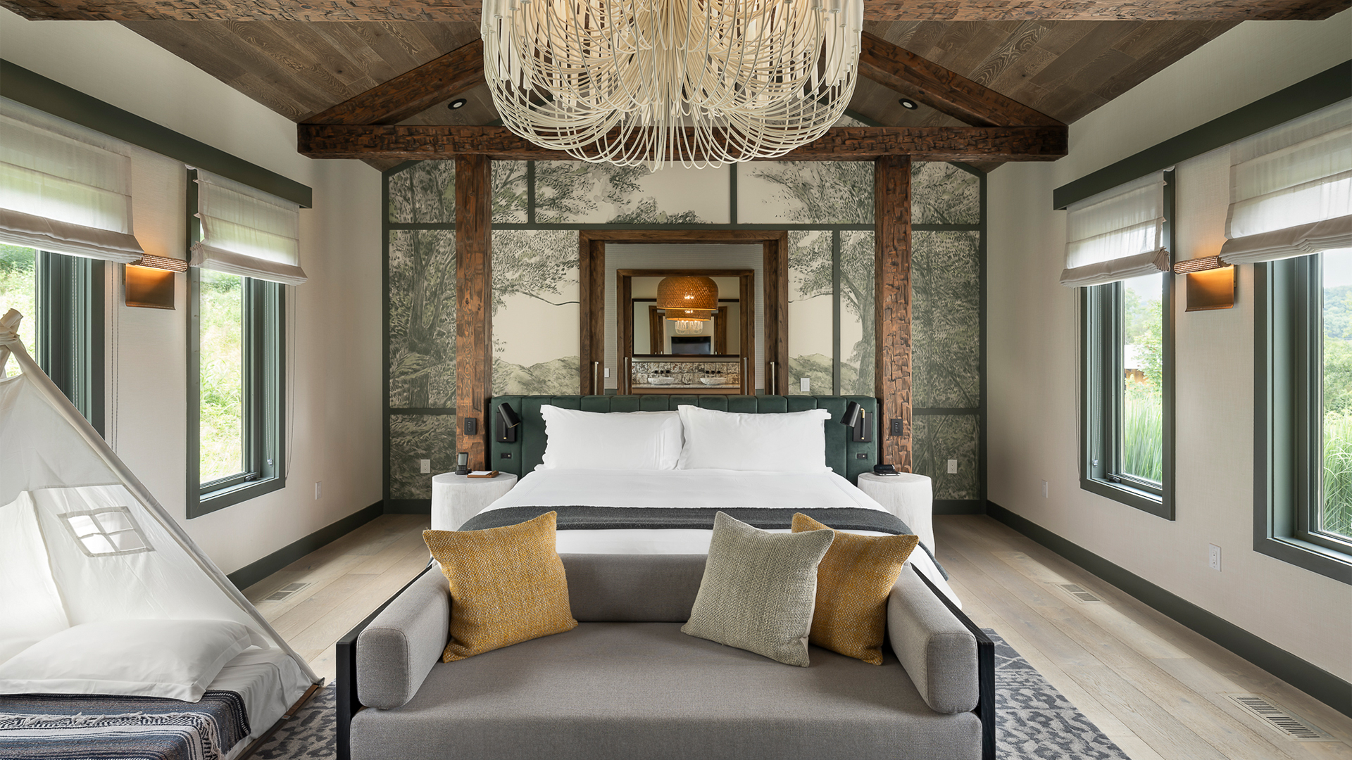 a bedroom with a bed and couch