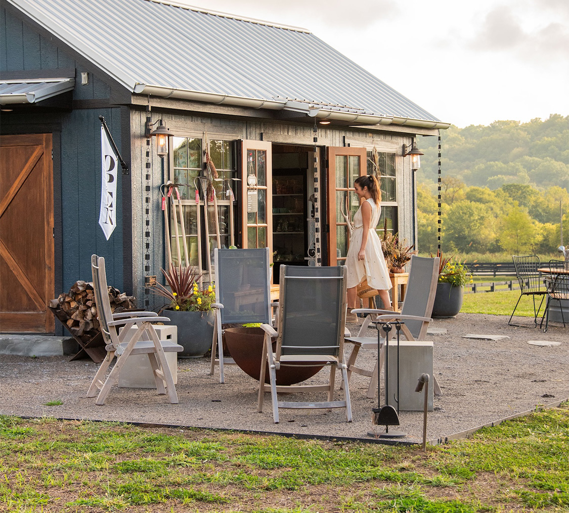 a woman standing outside a building