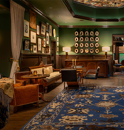 a room with a blue rug and a blue area rug
