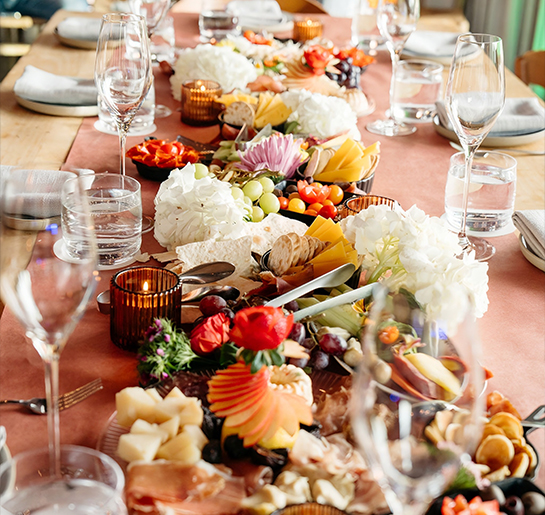 a table with food and glasses