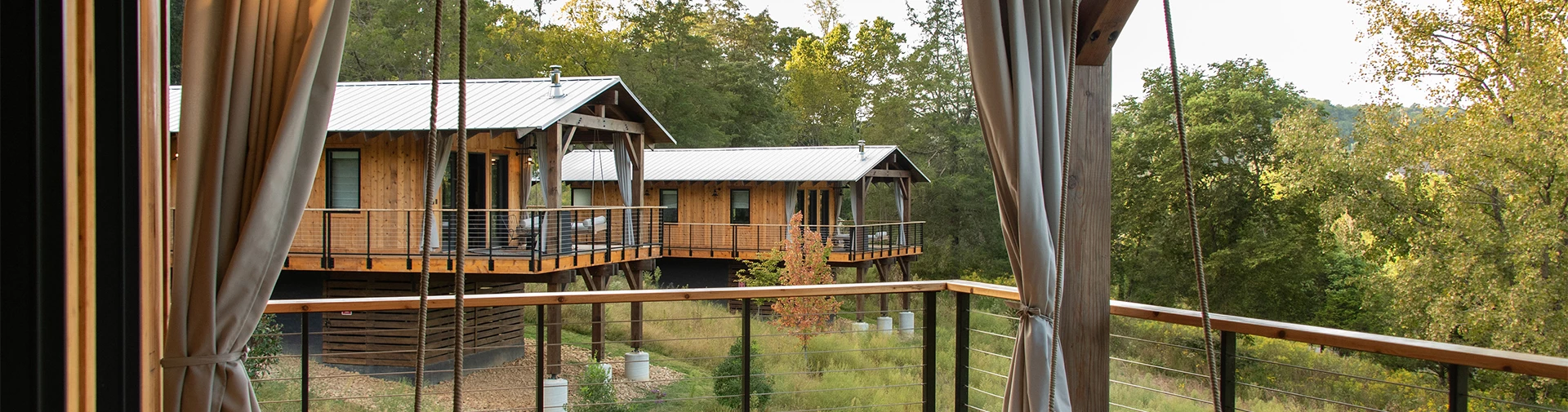 a house with a deck and a fence