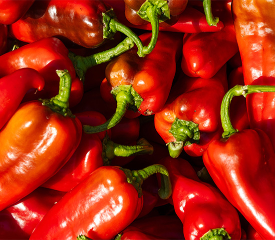 a pile of red peppers