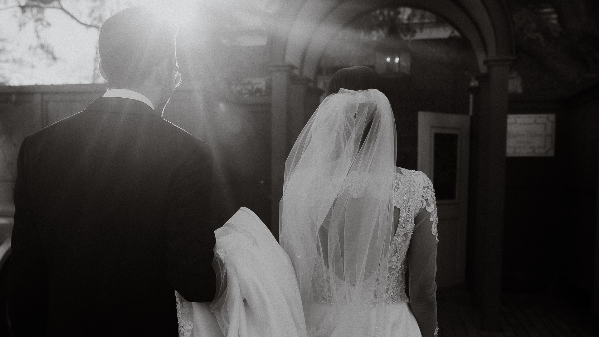 a bride and groom walking down a aisle