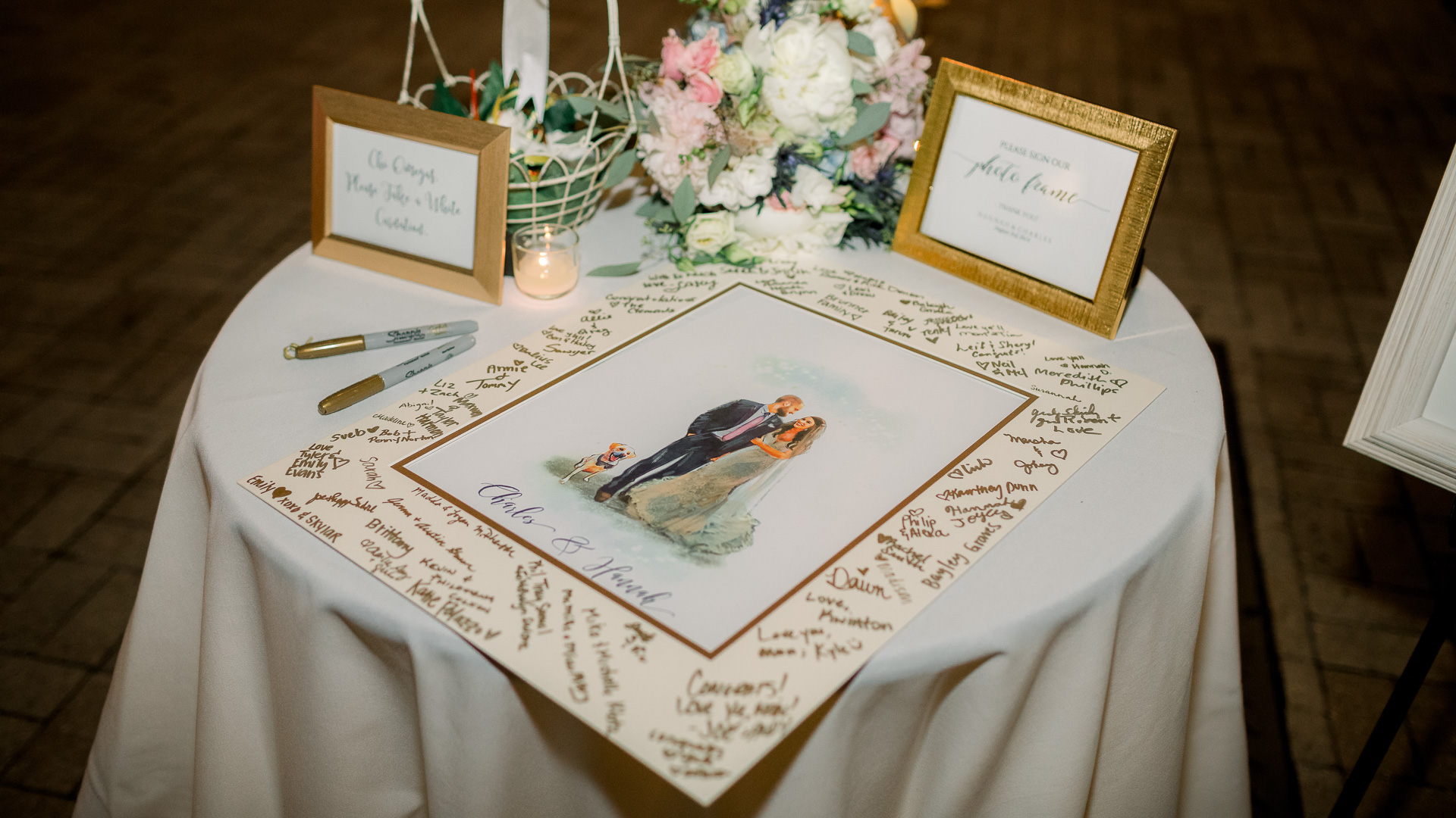 a table with a picture frame and writing on it