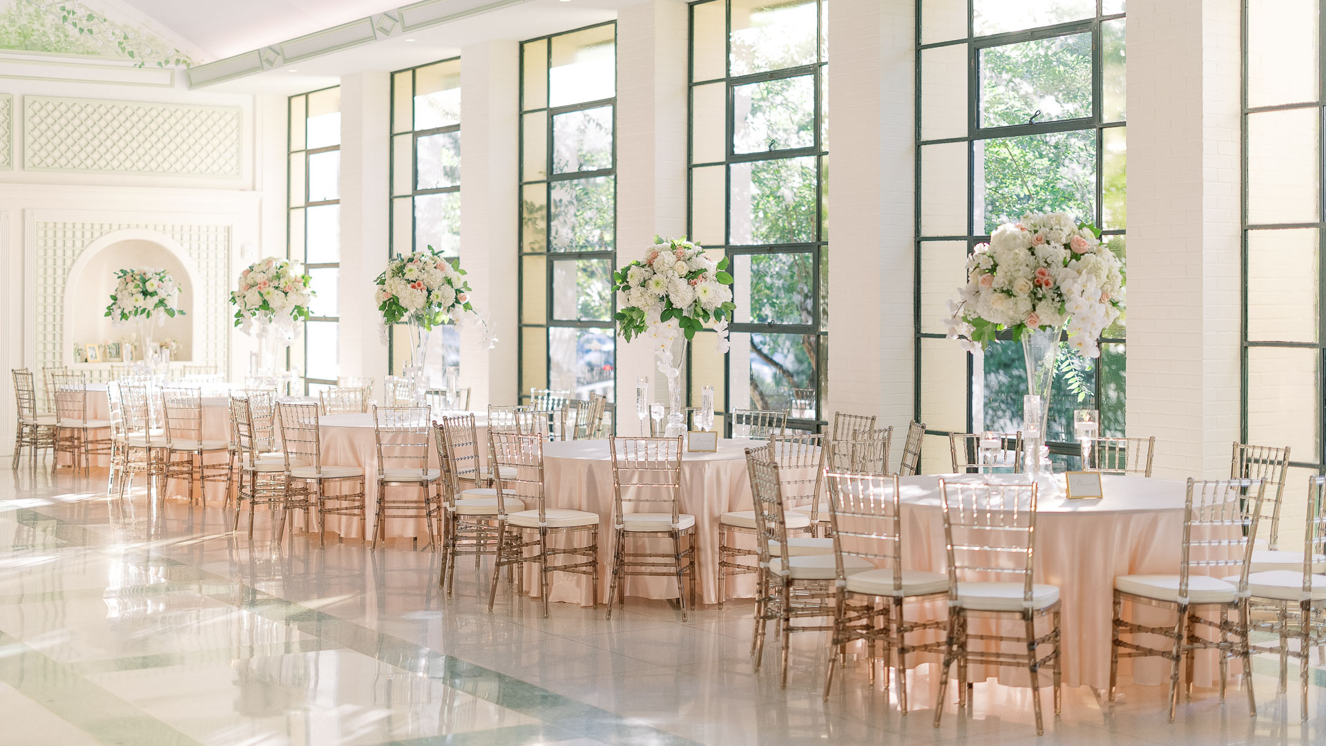 a room with tables and chairs