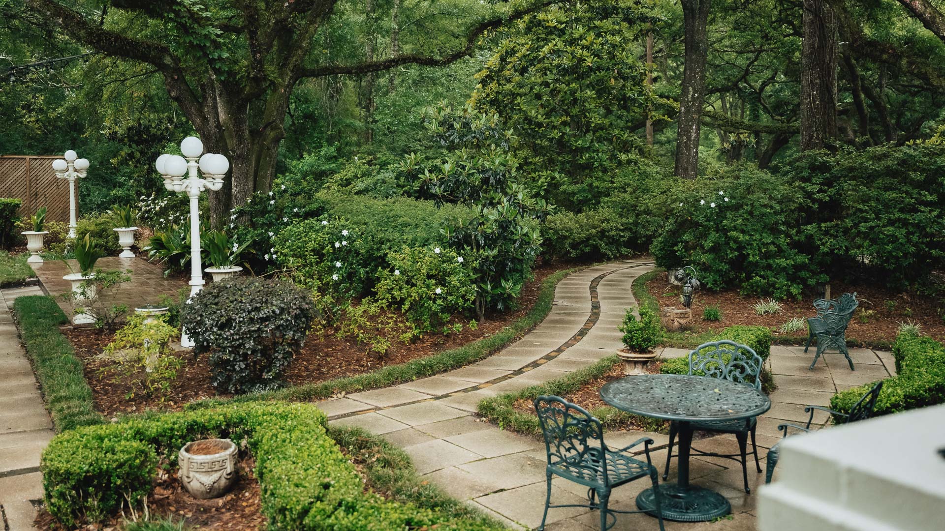 a stone path in a garden