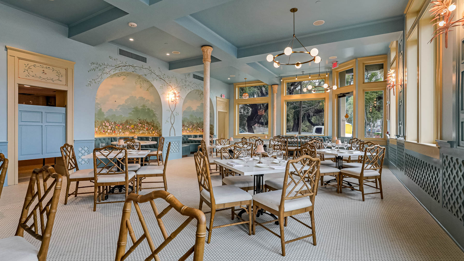 a room with tables and chairs