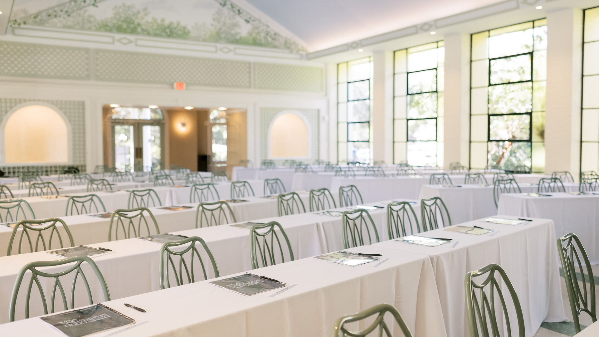 a room with tables and chairs