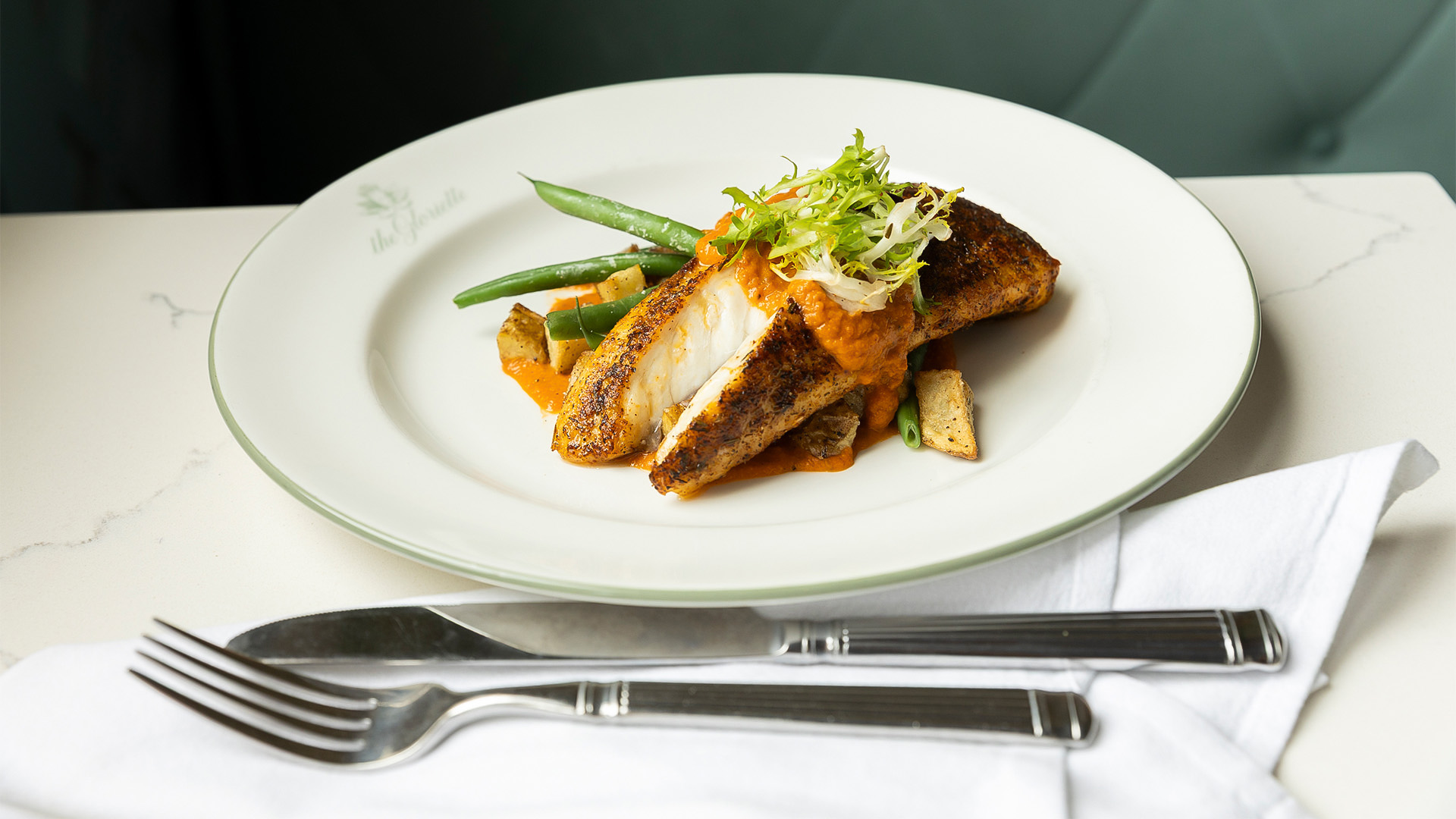 a plate of food with a fork and knife