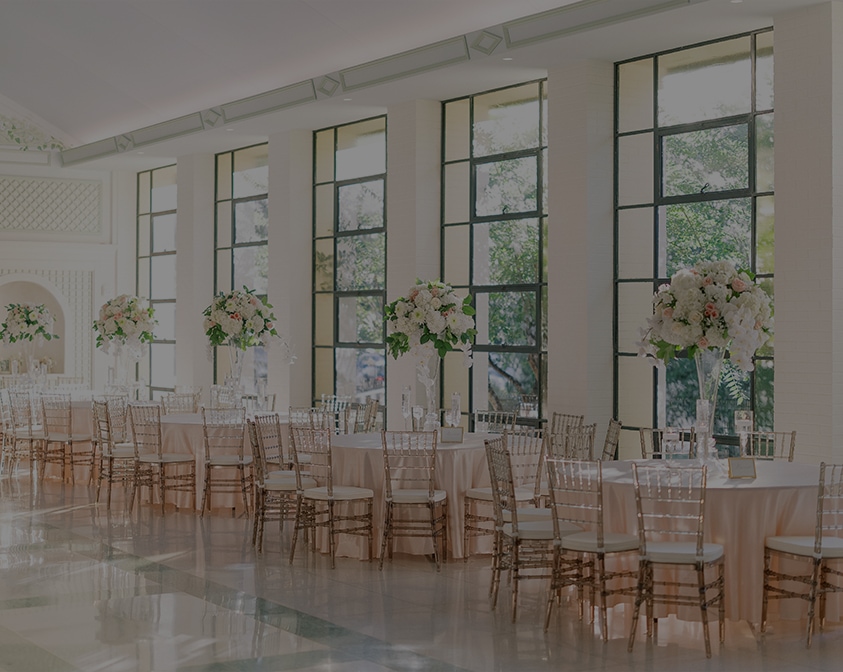 a room with tables and chairs
