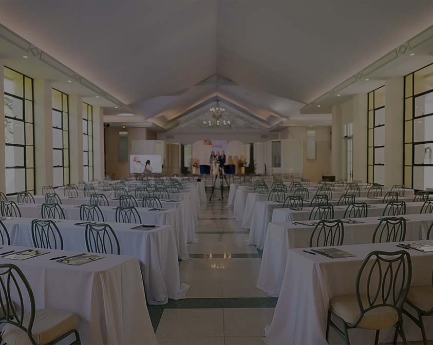 a room with tables and chairs