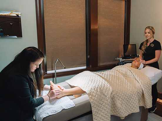 a woman getting foot massage