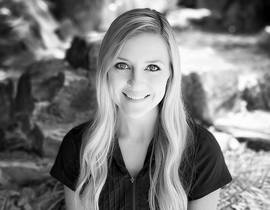 a woman smiling for a picture