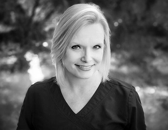 a woman smiling at camera