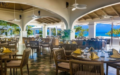 a restaurant with tables and chairs