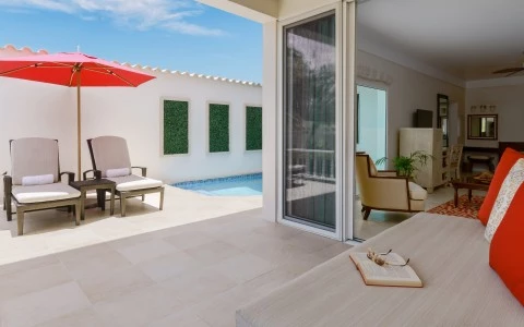 spice island beach resort image library accommodations anthurium pool suite_exterior 5d360ad4b52bc
