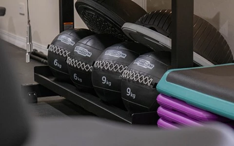 a shelf with balls on it