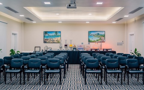 a room with chairs and a table