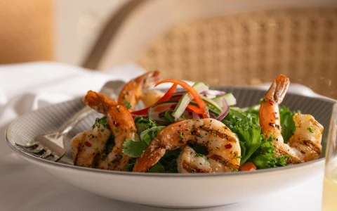 a bowl of shrimp salad