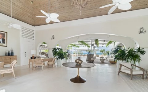 a room with a table and chairs