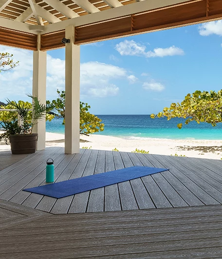 beachfront pavilion with a blue yoga mat