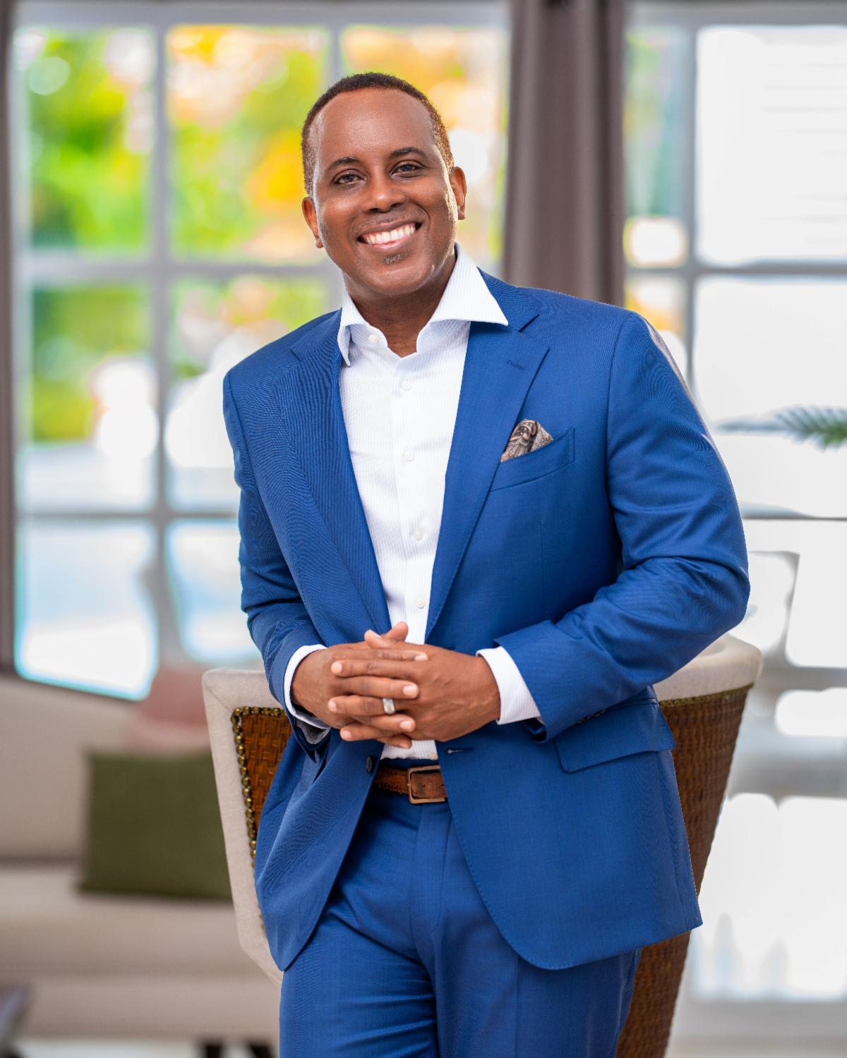 a man in a blue suit