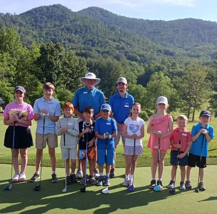 a group of people posing for a photo