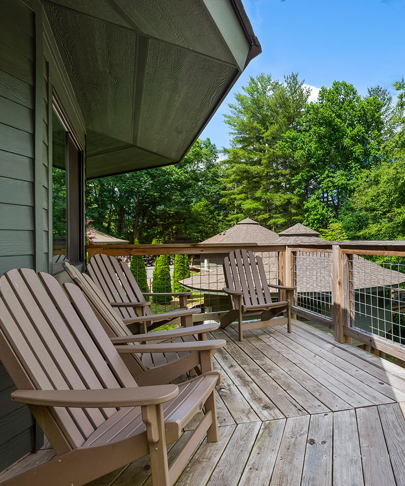 a deck with chairs on it