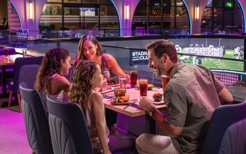 a group of people sitting at a table