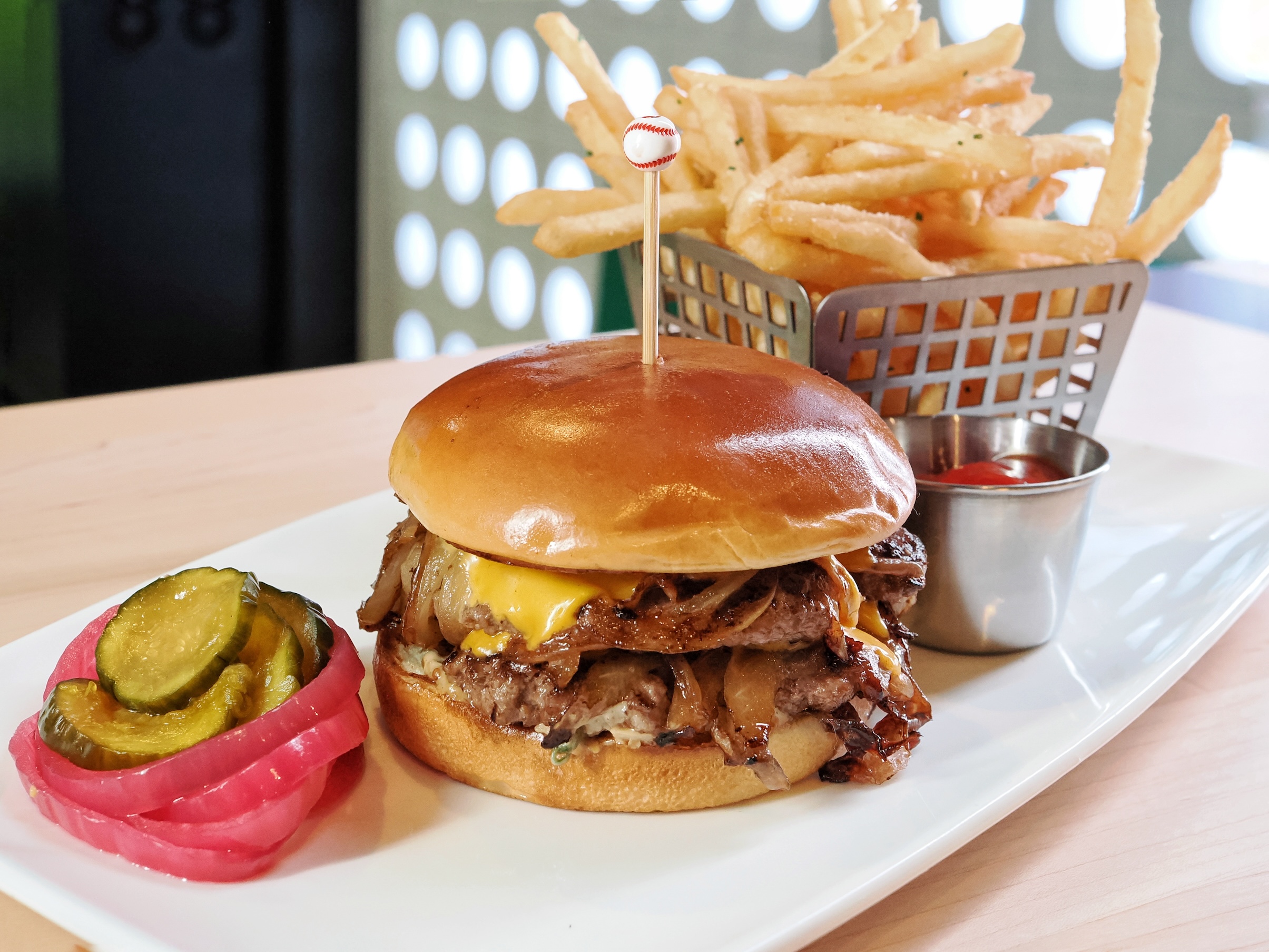 a burger and fries on a plate
