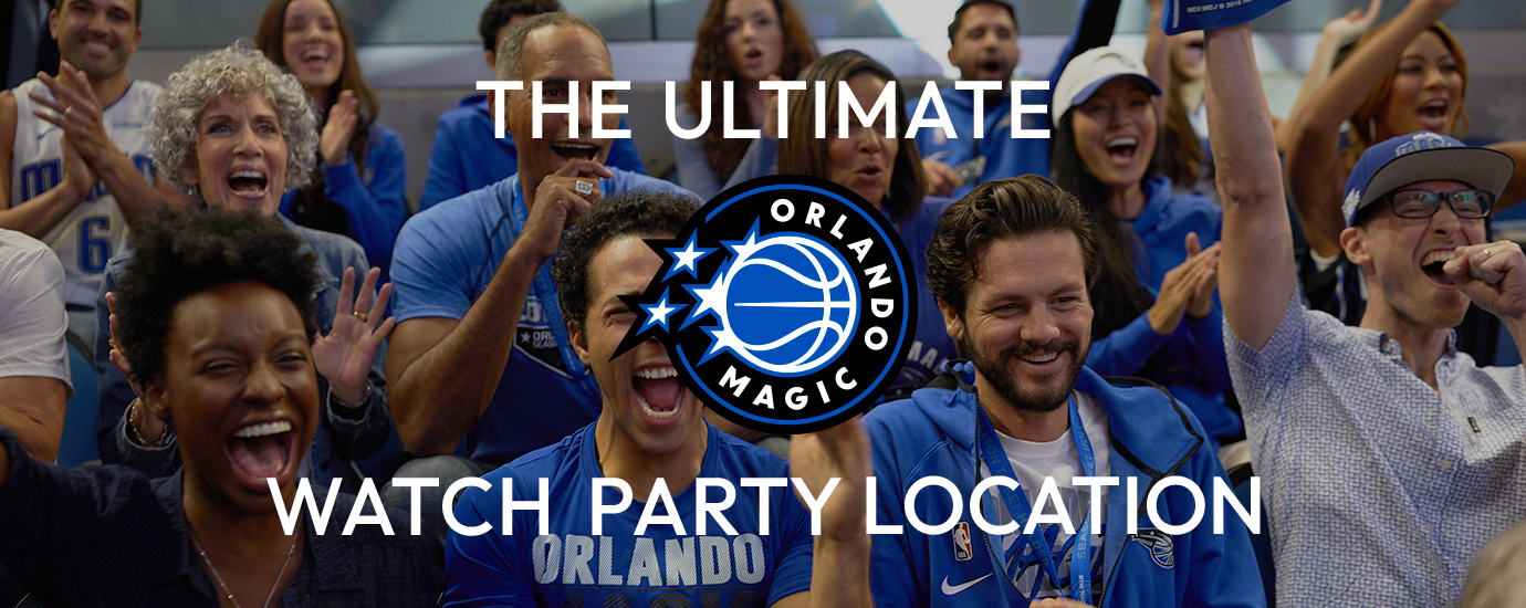 a group of people in blue shirts