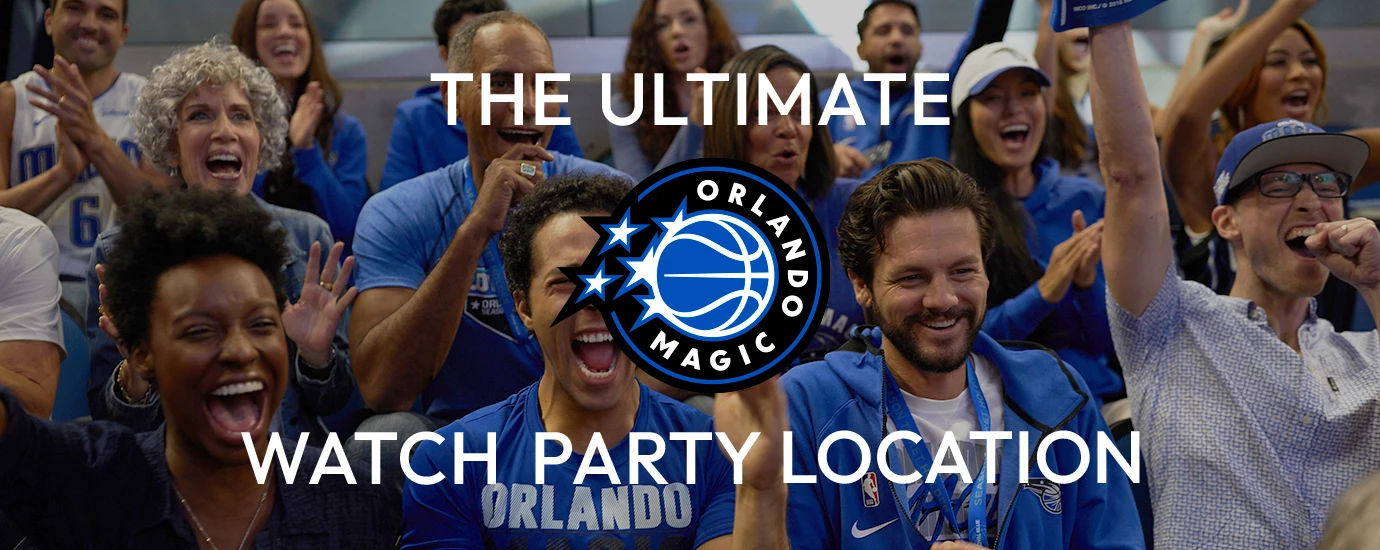 a group of people in blue shirts