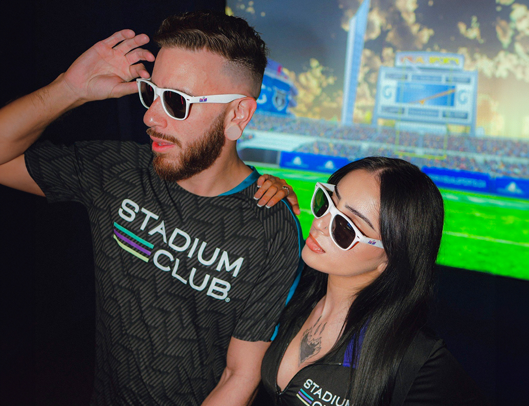 a man and woman wearing sunglasses