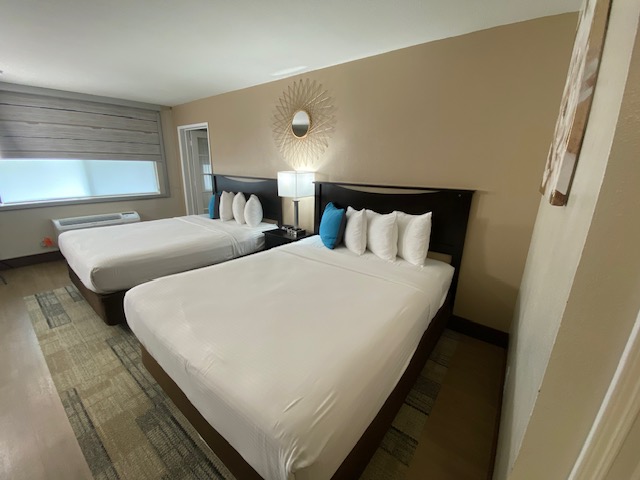 two beds in a hotel room