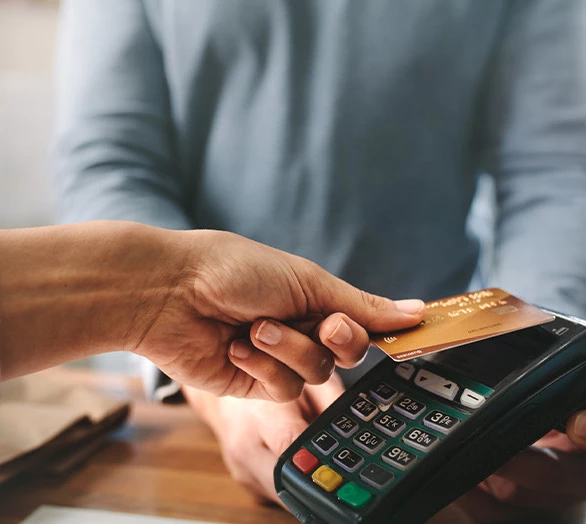 person paying with card