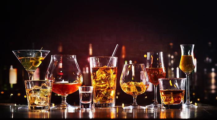 a group of glasses with liquid in them