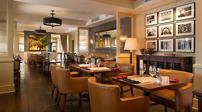 a restaurant with tables and chairs