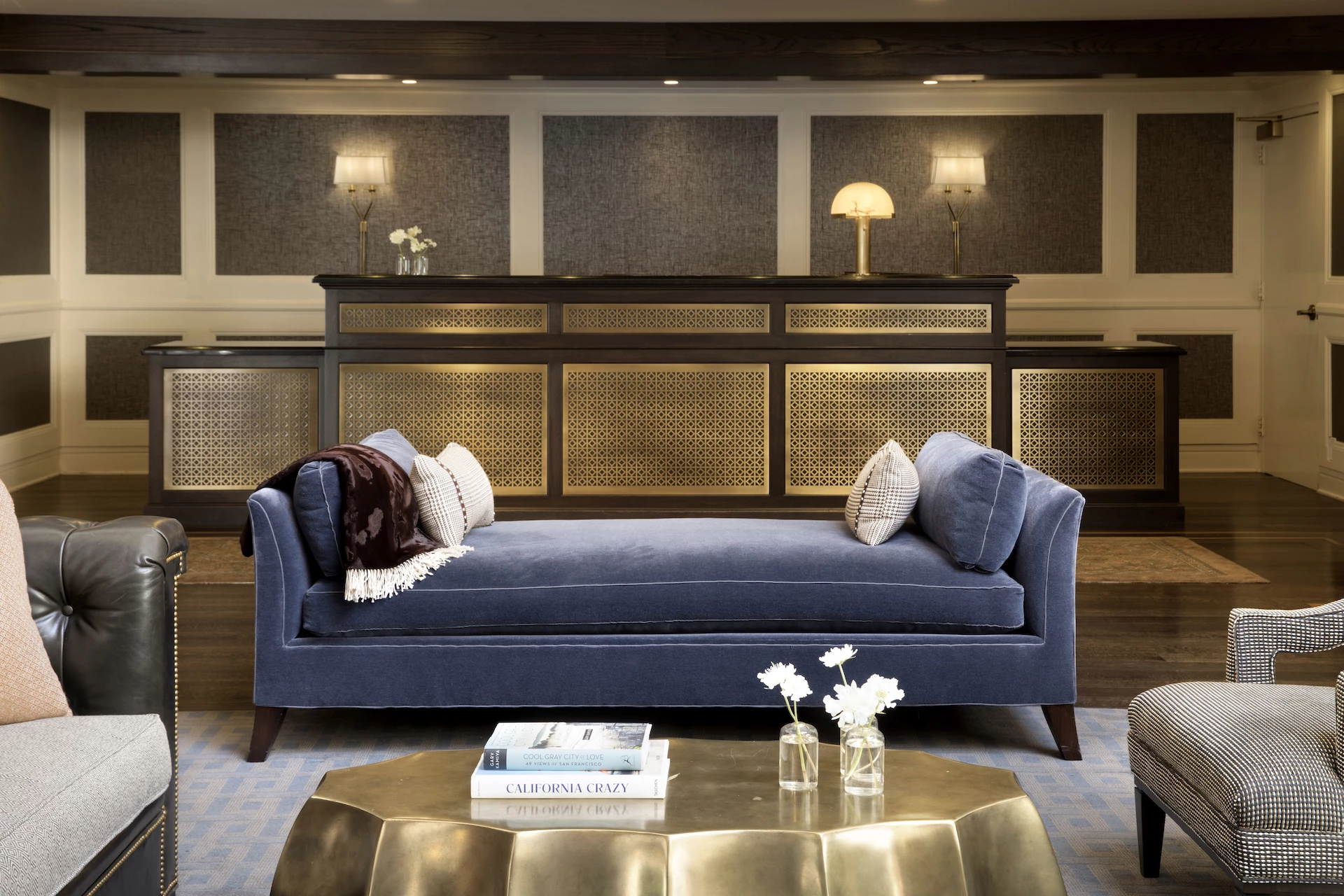 blue velvet couch in a lobby