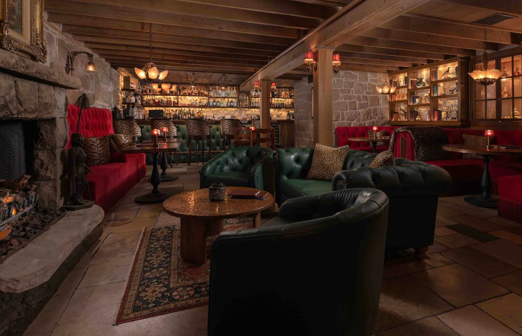 a room with a bar and a couch