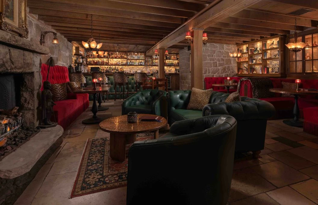 a room with a bar and a couch