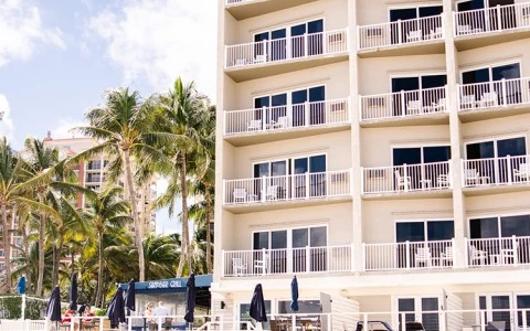 a building with many windows and a beach
