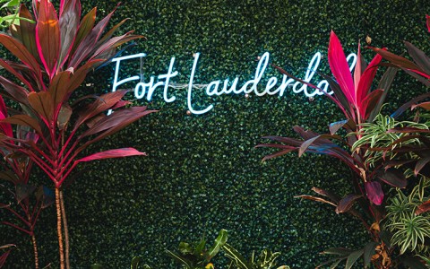 a sign with plants on it