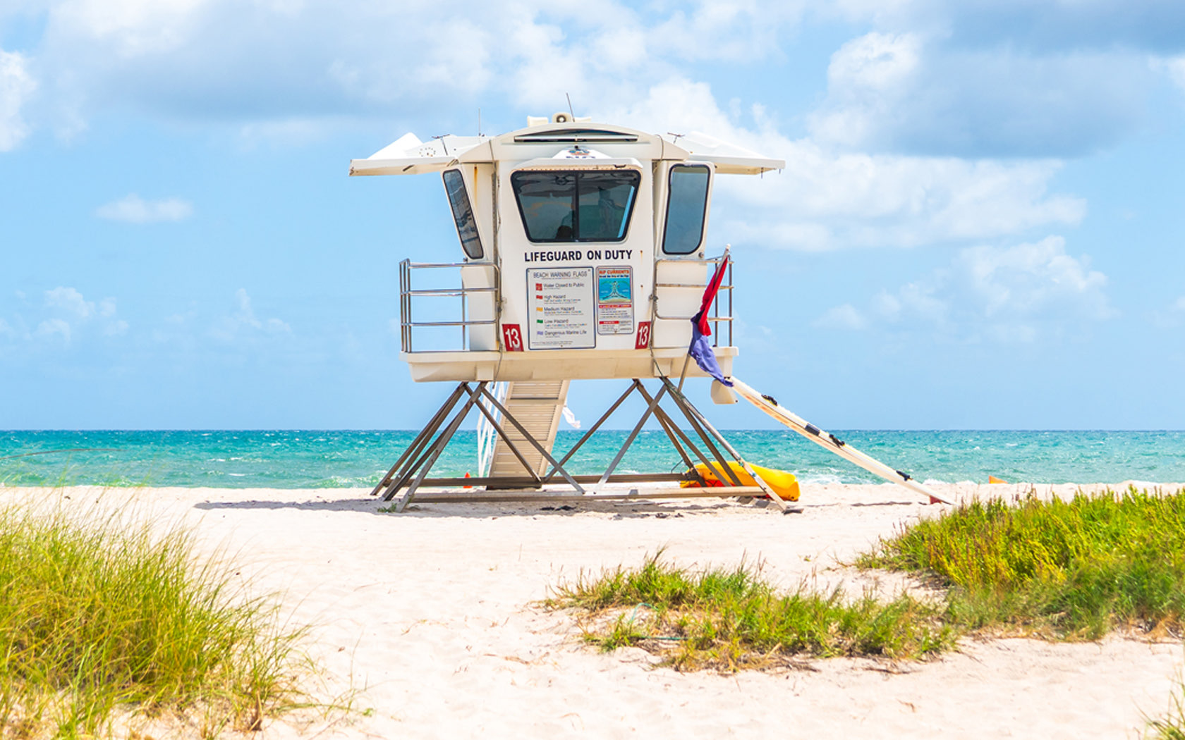 lifeguard house near the water on the beach