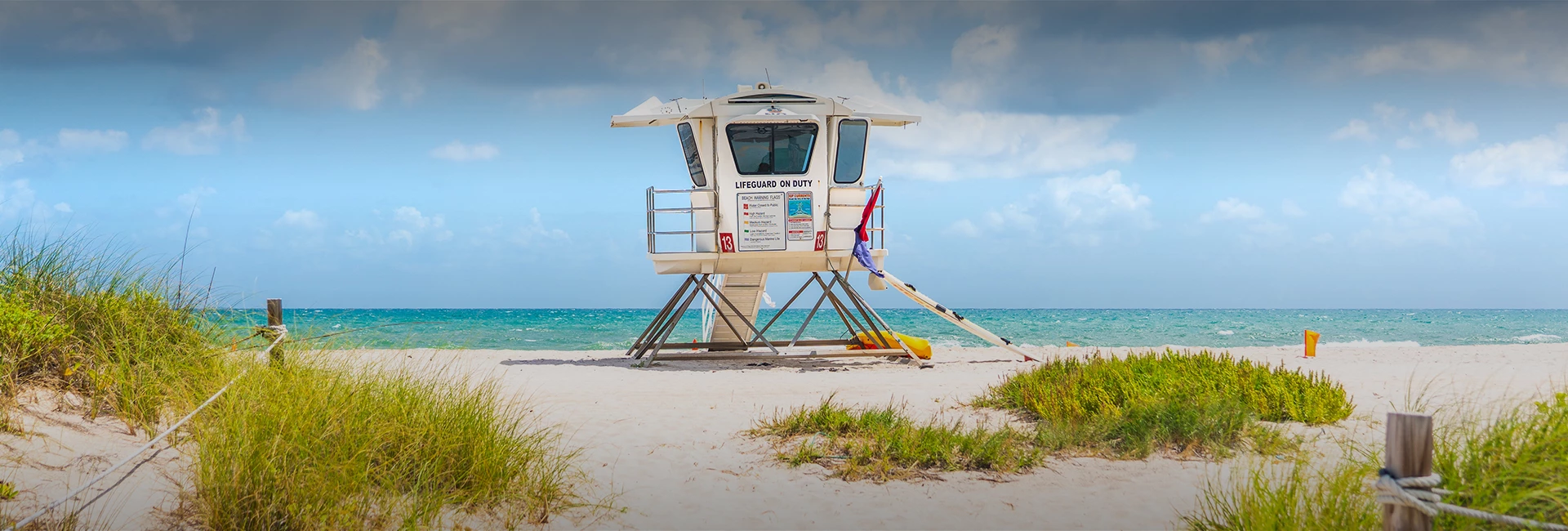 lifeguard house near the water on the beach