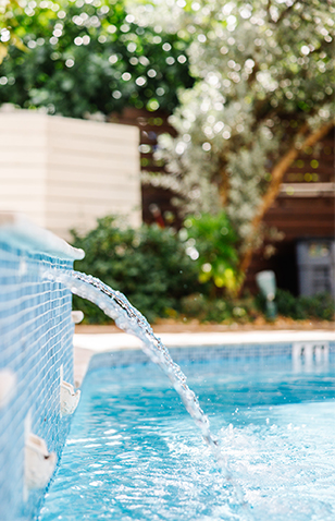 a water flowing into a pool