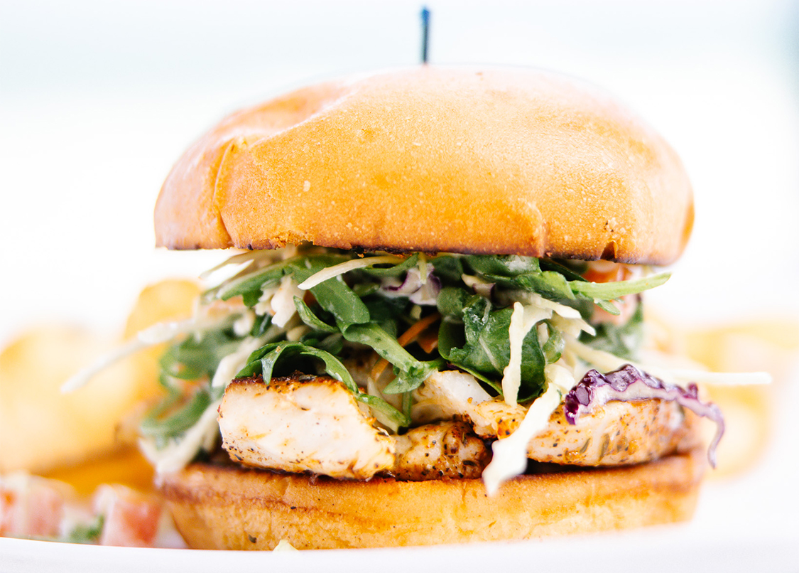 a close up of a burger