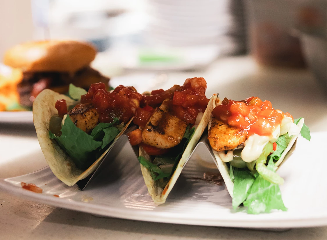 a group of tacos on a plate