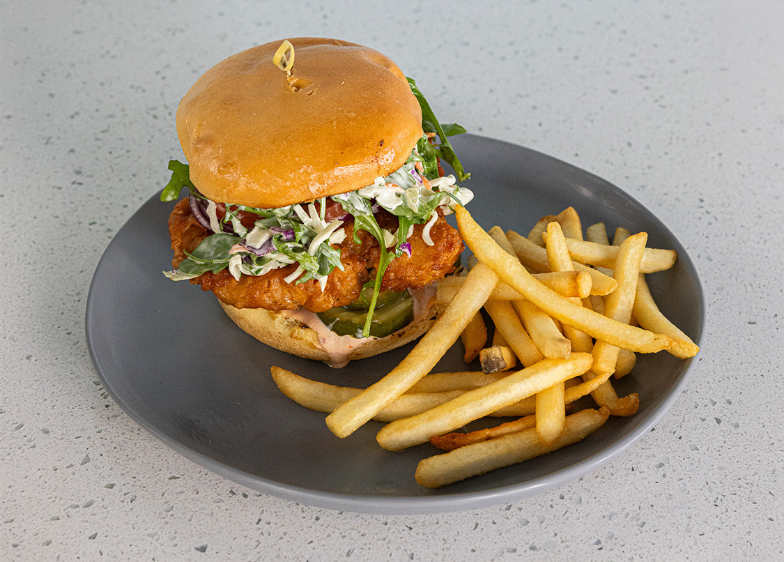 a burger and fries on a plate