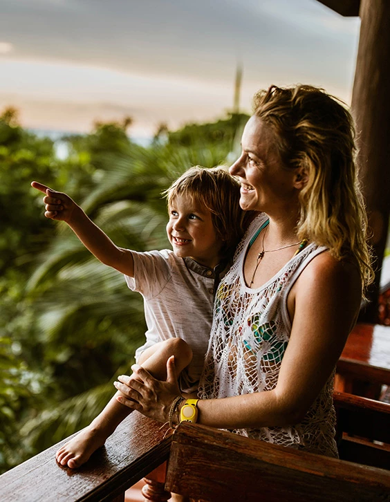 a woman holding a child