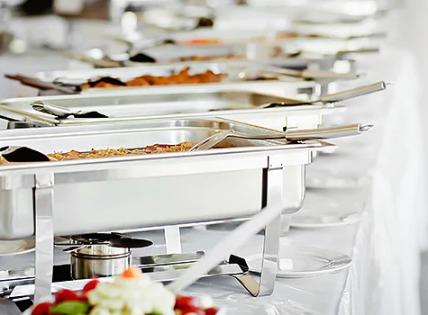 silver serving trays lined in a conference center